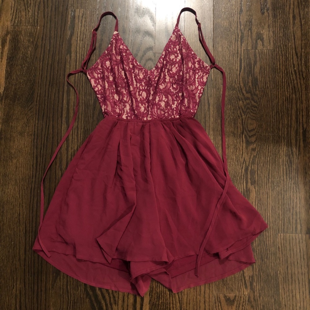 Romper with flare shorts and open back